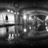 Man walks down the Albion Channel BW